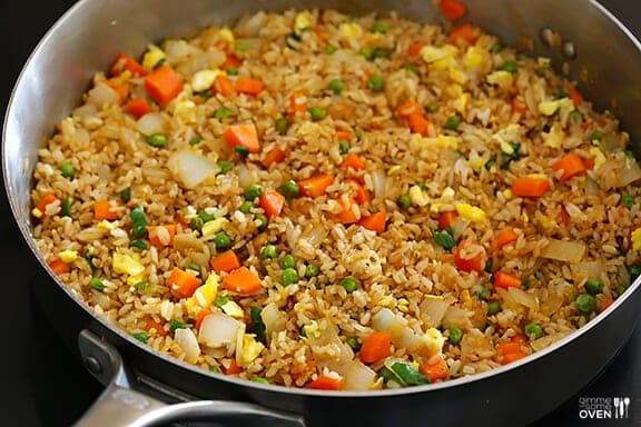 Golden fried rice with vegetables and protein, a classic Asian dish