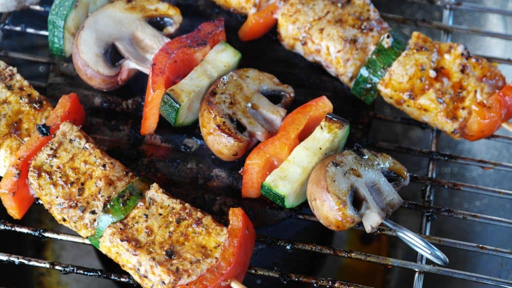 Colorful plate of grilled meat and roasted vegetables, a balanced and delicious meal