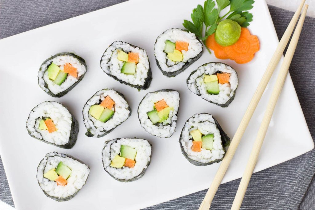 Fresh rice rolls filled with colorful vegetables and protein, a light and healthy snack