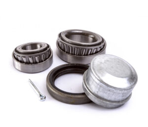 Parallel bearings The popular choice for off-road usage is the Parallel bearing which has a rating of 1600kg per pair.  Both sides of the hub will use the same sized bearing (L68149/L68110 - Ford inner). Two Tonne Bearings Kits For larger axles, these kits match an axle spindle diameter of 50mm with the outer bearing going over a 31.75mm shoulder. Inspecting bearings It is recommended that you inspect and repack your trailer or caravan wheel bearings at least once a year and replace if worn or damaged. It is also a good idea to carry at least one spare caravan wheel bearing kit and grease, especially if travelling in remote areas. After replacing the bearings, check the hubs for any excessive heat output after 30 minutes of travel on day one.