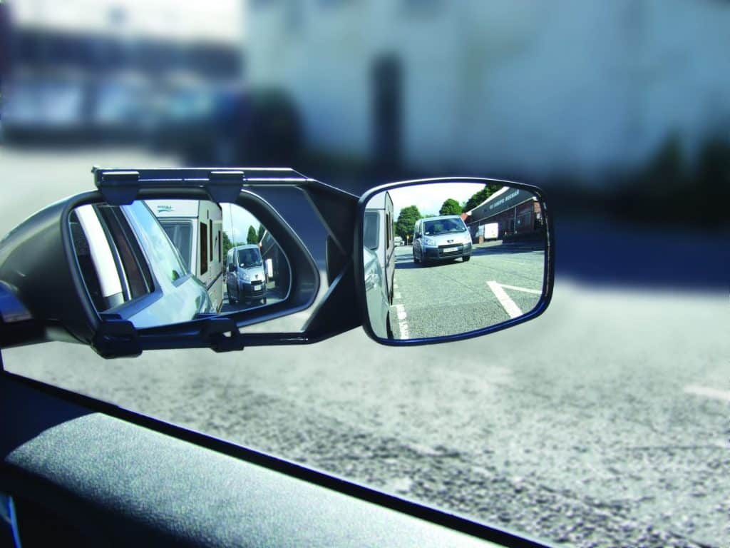 Caravan towing mirror enhancing visibility while towing a trailer