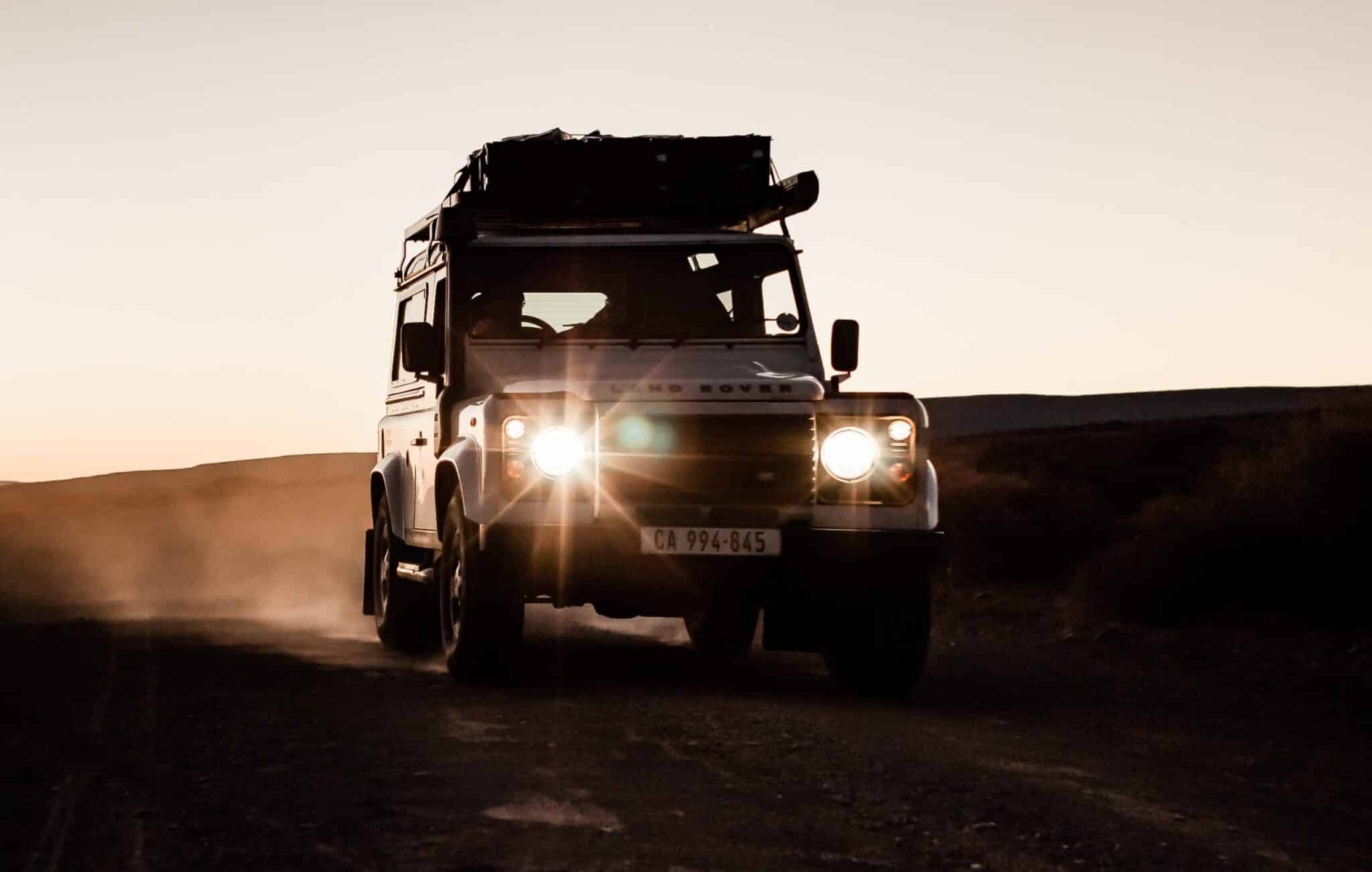 A truck running in a peaceful location in the desert