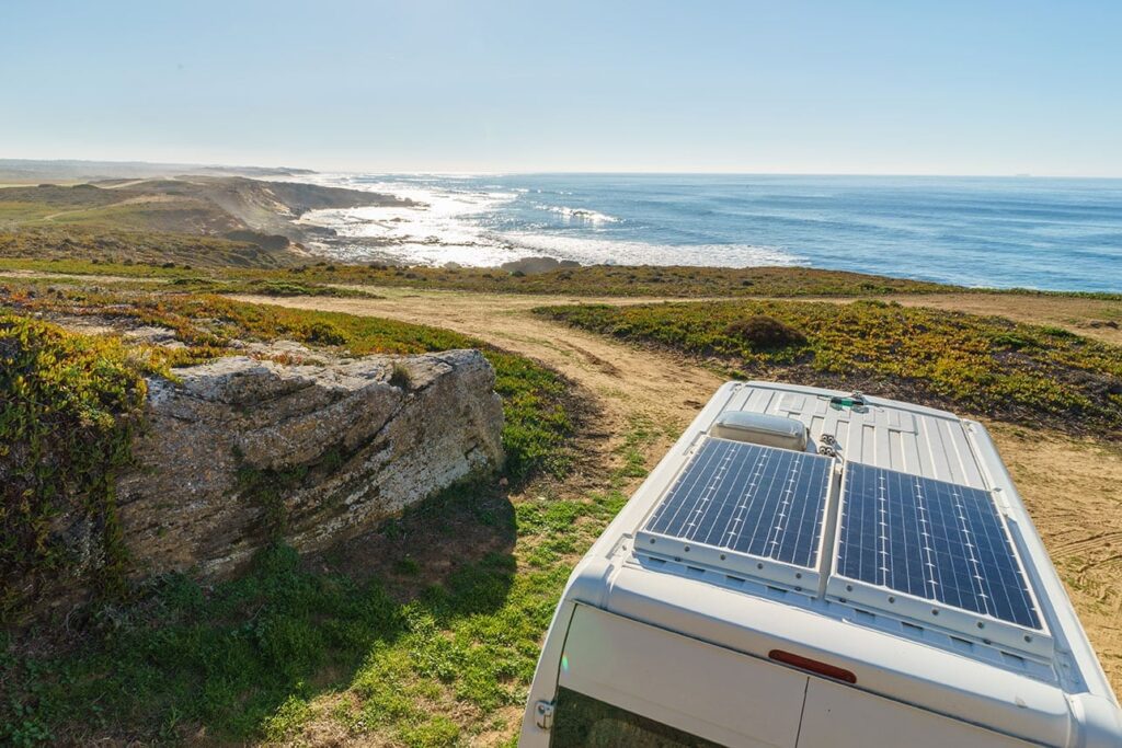 Caravan parked on beach with stunning ocean view