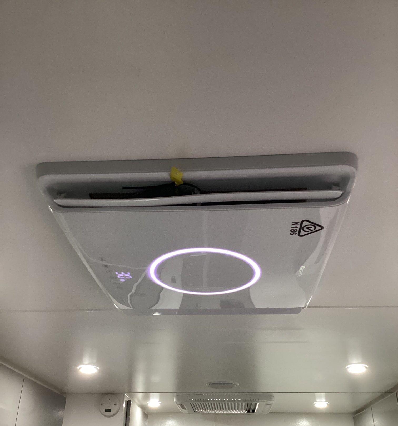 Close-up view of the caravan air conditioner unit, highlighting its design and features
