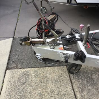 Weight distribution hitch displayed outside shop, ready for installation and improved towing stability