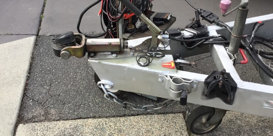 Weight distribution hitch displayed outside shop, ready for installation and improved towing stability