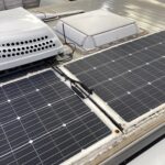 Restoring solar power: Caravan roof repair focuses on a malfunctioning solar panel for sustainable travel
