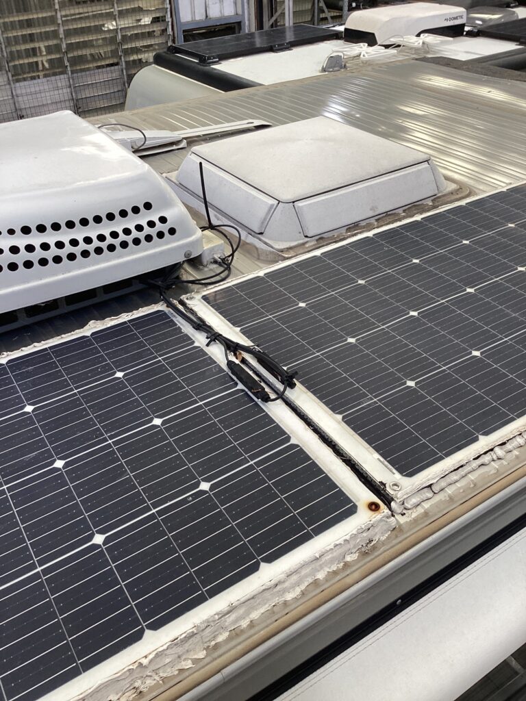 Restoring solar power: Caravan roof repair focuses on a malfunctioning solar panel for sustainable travel