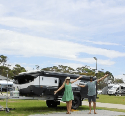 A couple enjoying their caravan with JackaJay Electric Roof System
